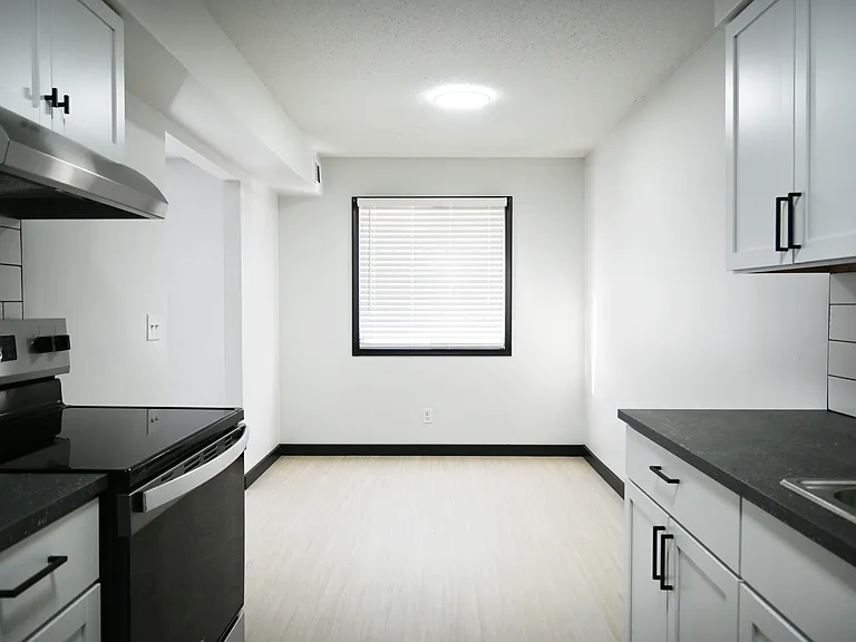 Kitchen and eating nook in a unit at Cielo 120.
