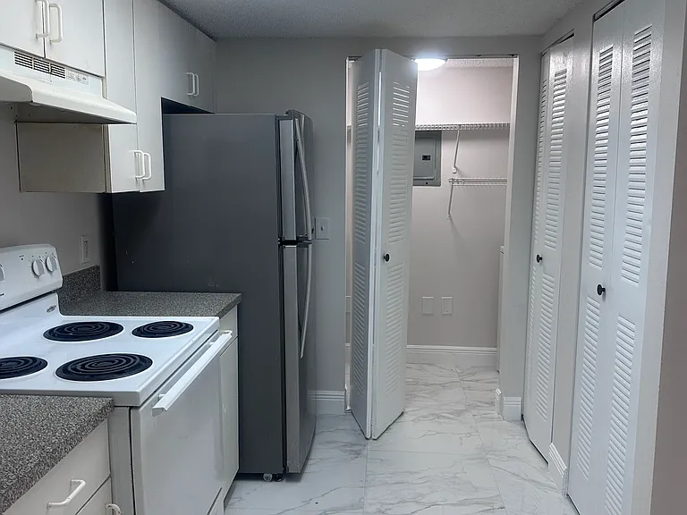 5011 Wiles Rd #207 — Photo 23