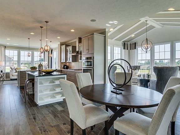 This photo is a model home photo or artist rendering due to construction stage.