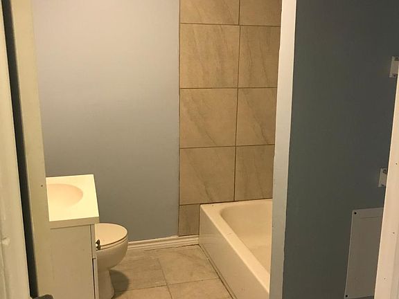 Bathroom 18" tile throughout