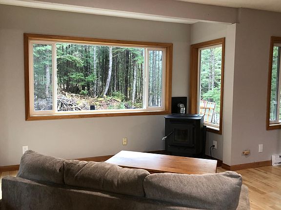 Main area view with pellet stove that heats the entire house.