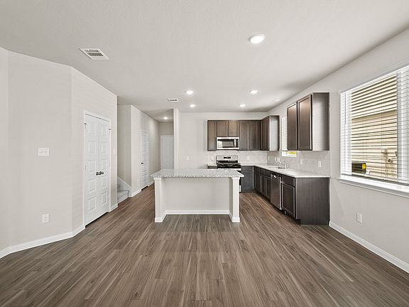 Family Room to Dining Area and Kitchen