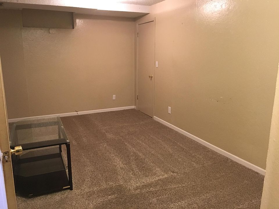 Living room with storage closet. 