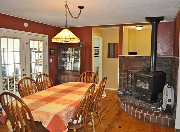 Heart pine floors set the tone for this dining room