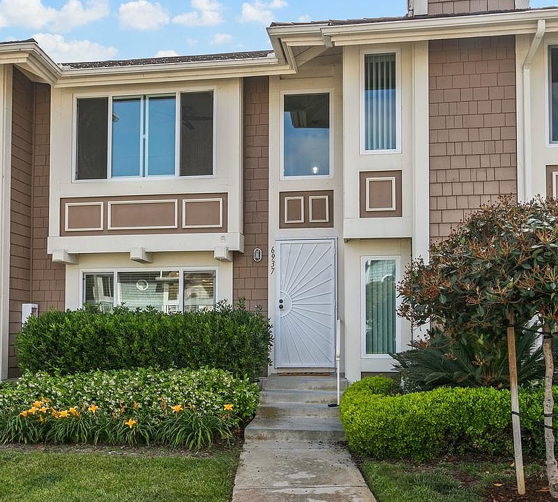 Front exterior- Ample parking in community
