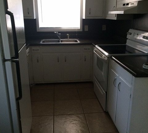 Tile kitchen with lots of storage!