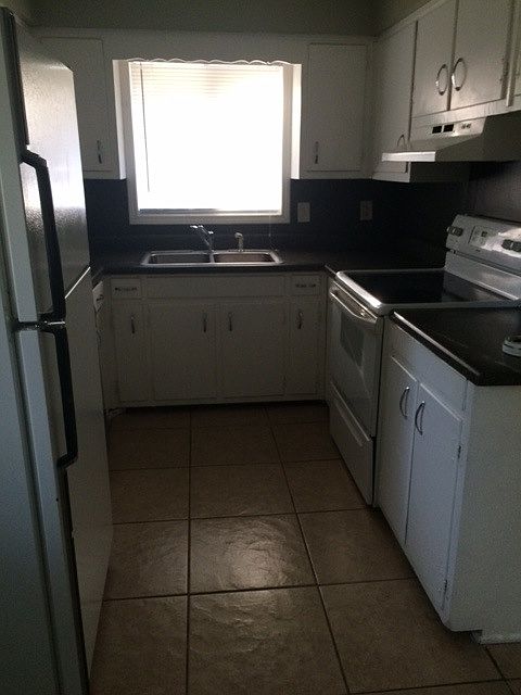 Tile kitchen with lots of storage!