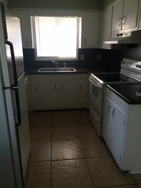 Tile kitchen with lots of storage!