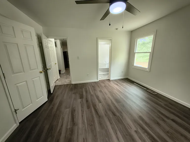 Master bedroom - view to bathroom and hallway