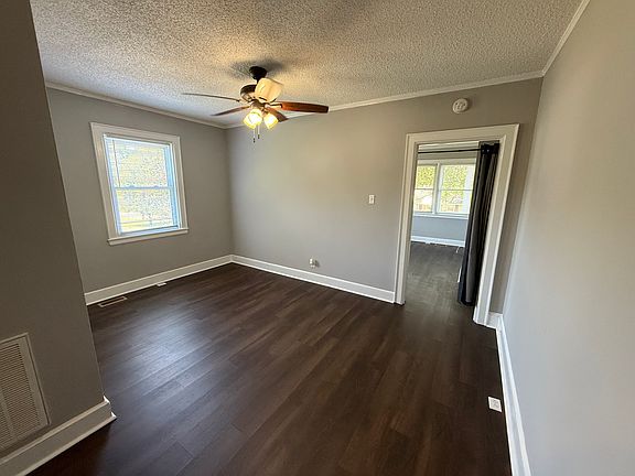 Bedroom, doorway to front living area