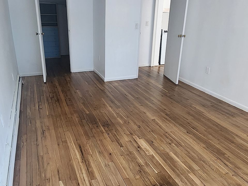 View from bedroom facing door and closet