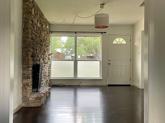 Breakfast nook opens into living room and kitchen