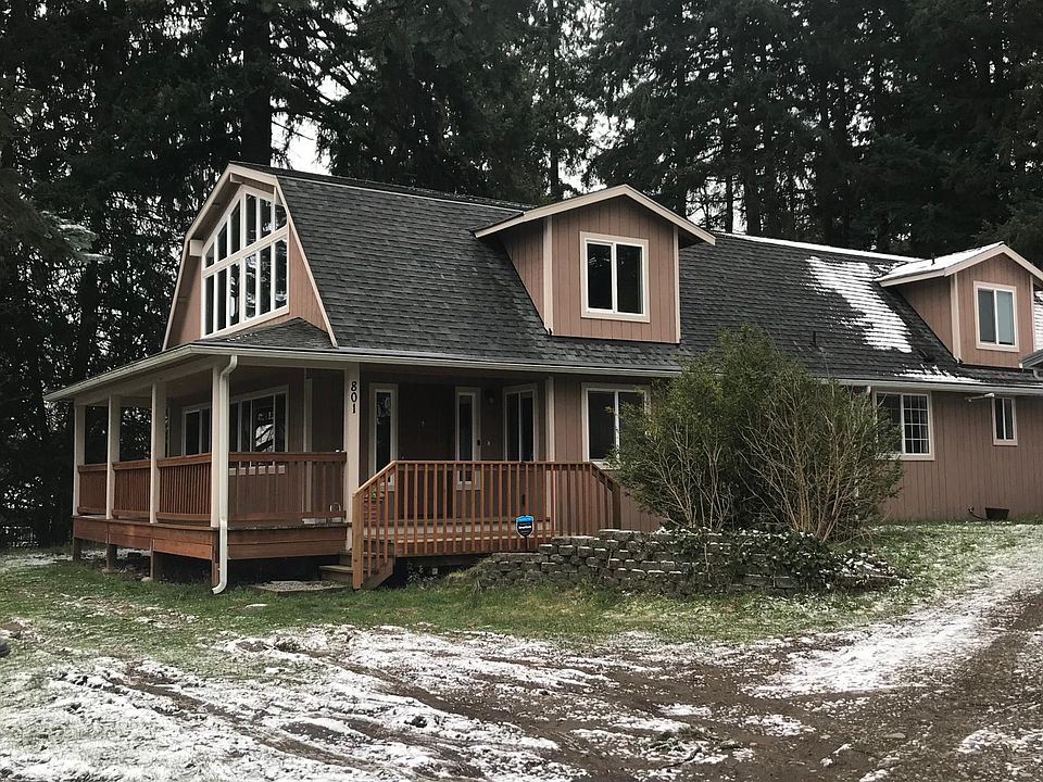 Front door and porch from driveway