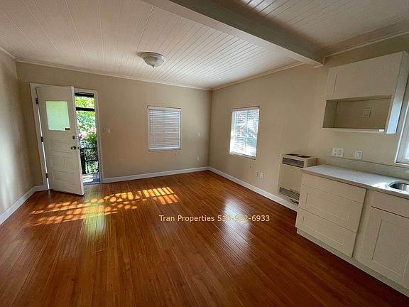 Kitchen looking out to living room.