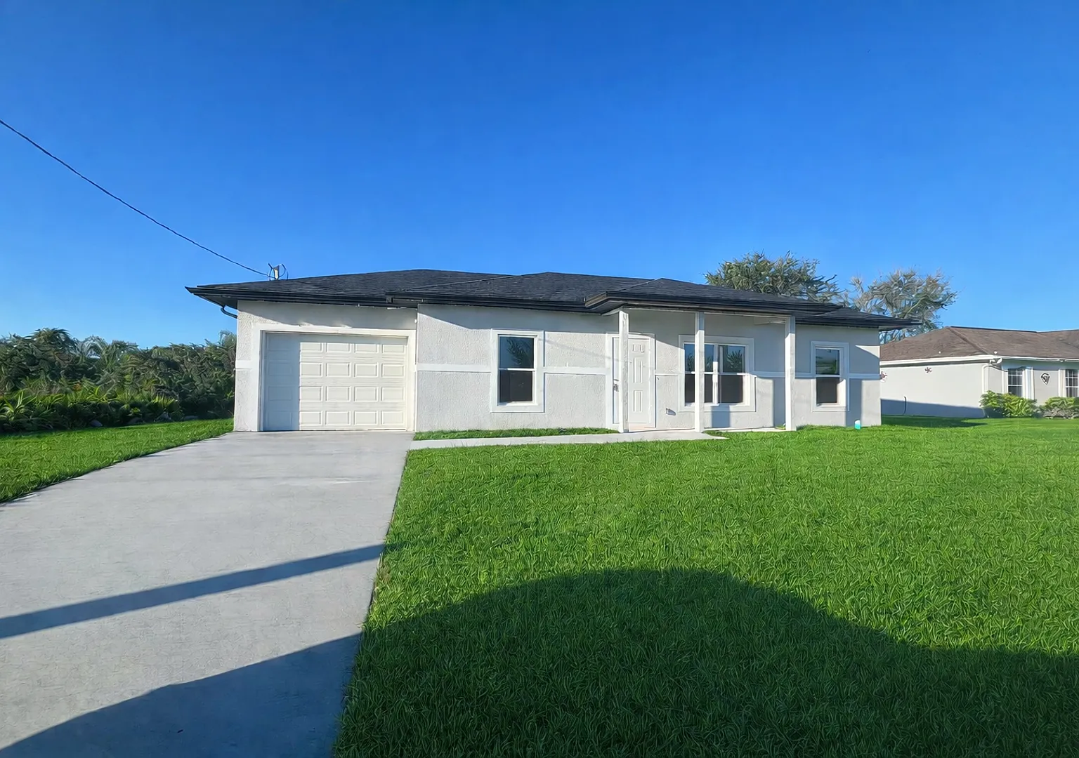New Construction- Modern 3 Bed / 2 Bath Home In E Lehigh Acres — Photo 1