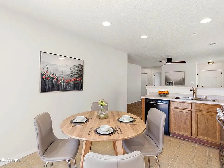 Virtually staged dining room. Furnishings not included.