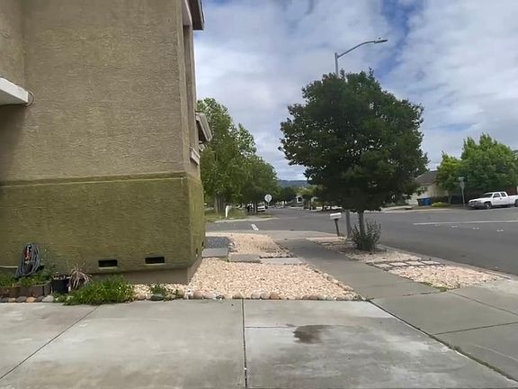 View from driveway. Conveniently located in the corner. Plenty of off street parking for your visits