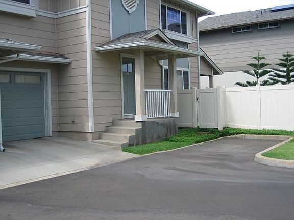 3rd parking stall in front of the house