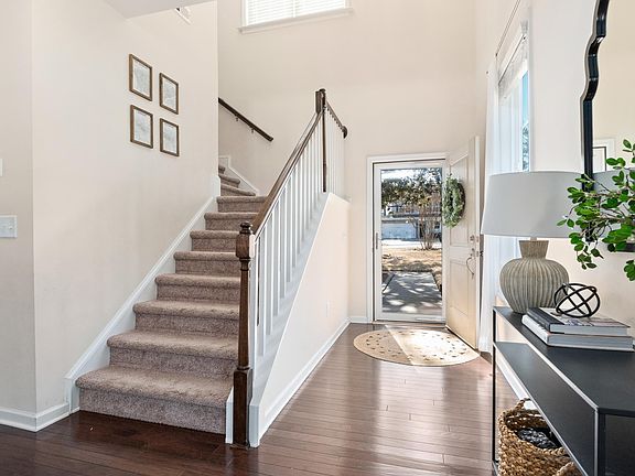 Front entrance with vaulted foyer.