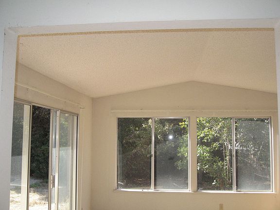 Open, airy main bedroom suite