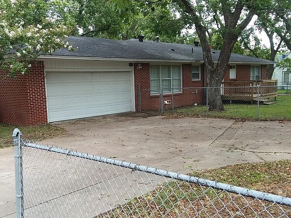 The house is at the intersection of two streets so there is access to the rear garage from the side street.