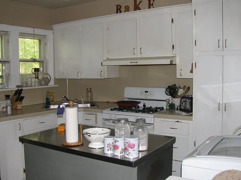 Spacious kitchen with W/D hookups and space for a small work table (island table and W/D not included).