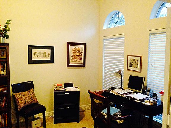 The spacious and well-lit den could also be used as a study or even a fourth bedroom.