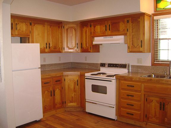 Kitchen with refrigerator, oven, and dishwasher