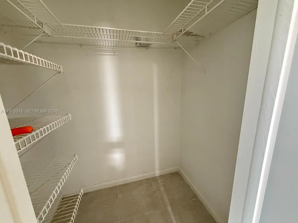 Photo 2 of 13 - 210 Canterbury Dr #210-J - West Palm Beach, FL Building Photo - 210 Canterbury Dr #210-J