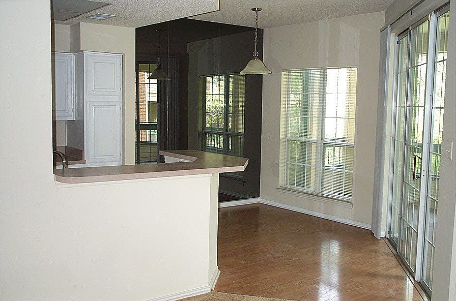 Dining room, patio access and open kitchen