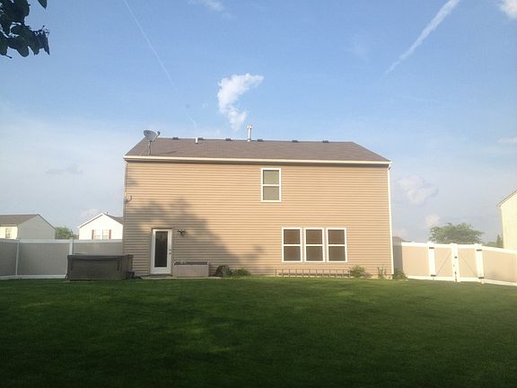 Back of House
						:
						View of Patio and Yard