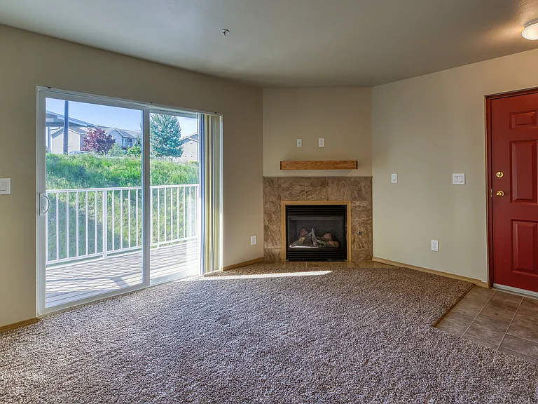 Cozy Fireplace With Sliding Door to Private Balcony or Patio