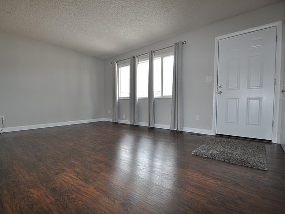 Front door entrance and main-level living room.