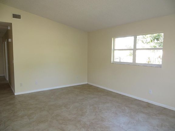 Living room with vaulted ceiling