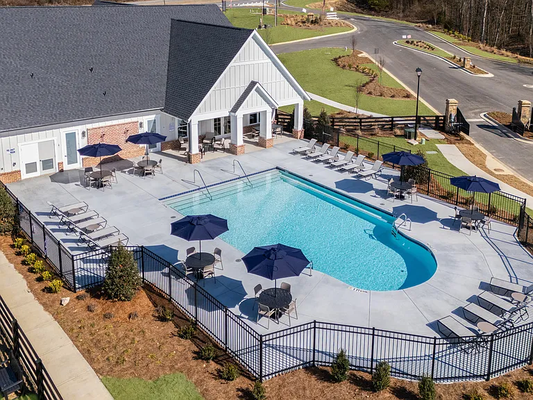 Aerial shot of the pool and back of the clubhouse.