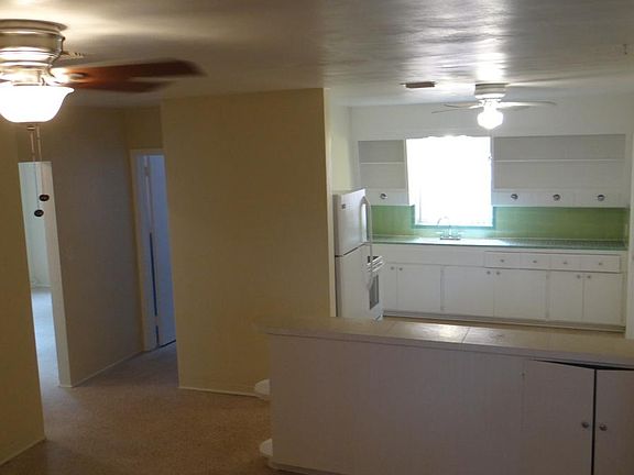 View from living room to kitchen and others rooms