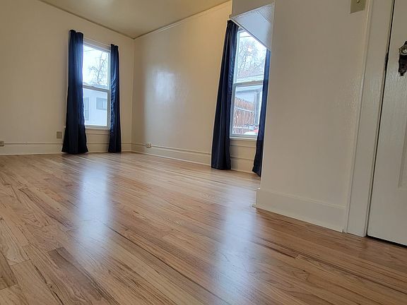 Bright bedroom with blackout curtains for privacy