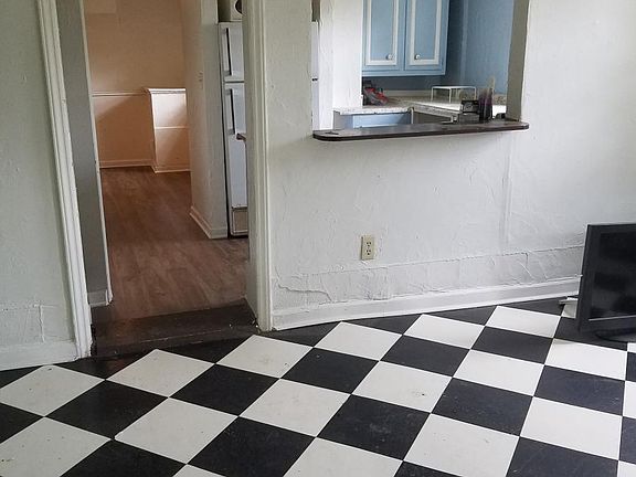 Steps down to kitchen & office/extra room