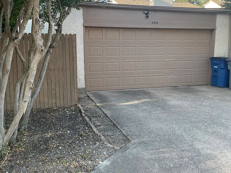 Large 2 car garage with storage.