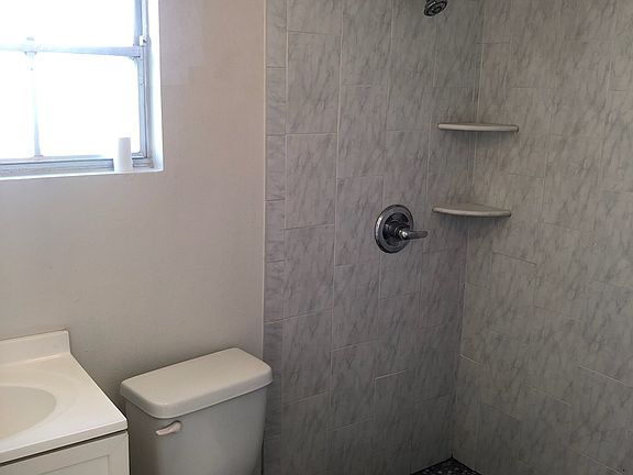 Shower and water closet area.