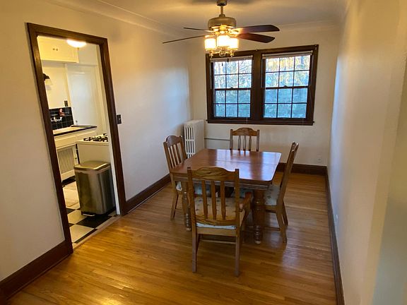 Dining room well-lit by south-facing windows.