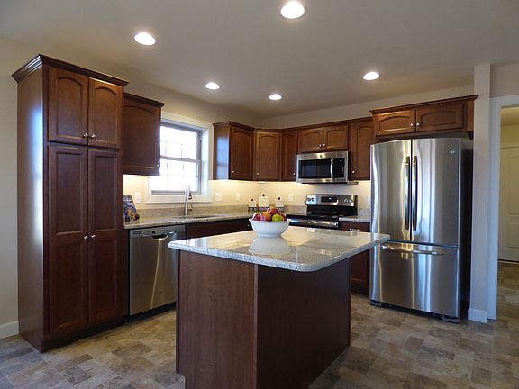 kitchen w granite and island
