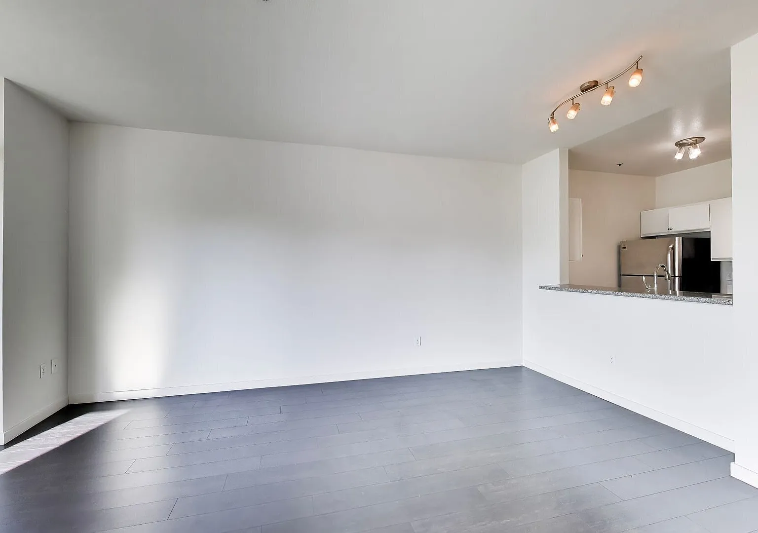 Modern 1-Bedroom with Lake & City Views | Garage Parking Available — Photo 4