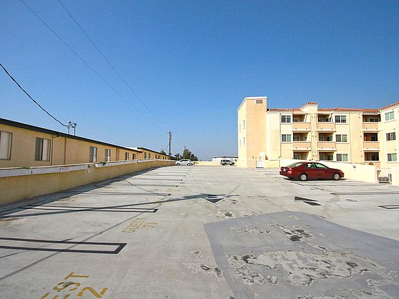 One assigned parking space and plenty of quest parking