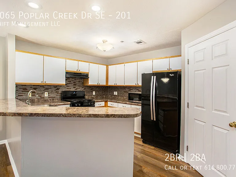 3065 Poplar Creek Dr SE #201 — Photo 4