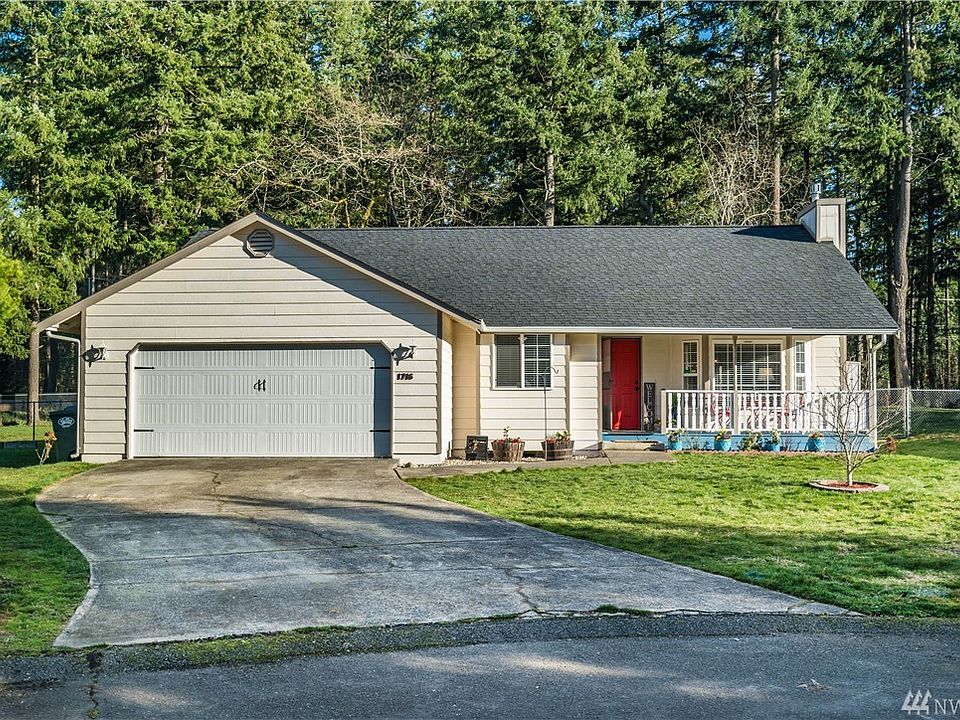 Front view of house. Established landscaping. Extra deep driveway.