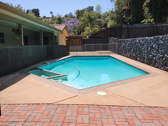 Paver patio at pool side