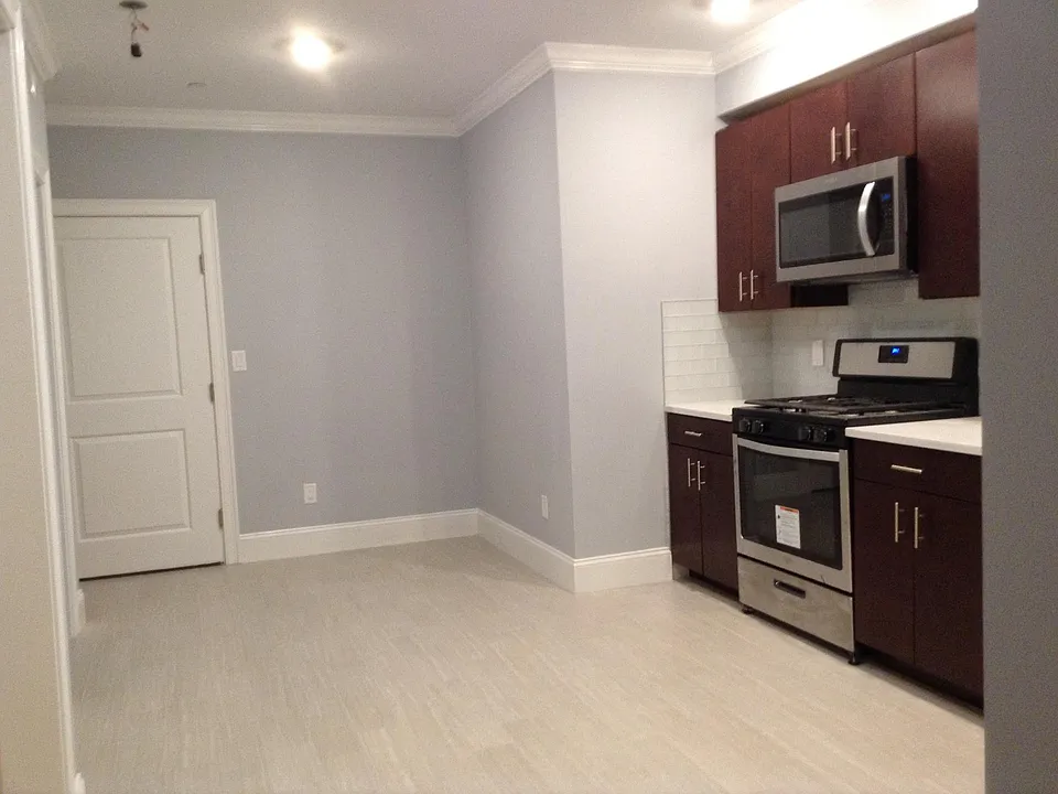 Spacious Kitchen to fit a nice table to serve everyone! Cherry wood cabinets with built in microwave.