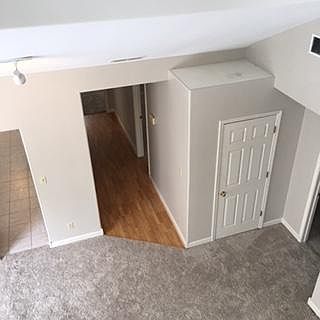 View down to living room from loft bedroom