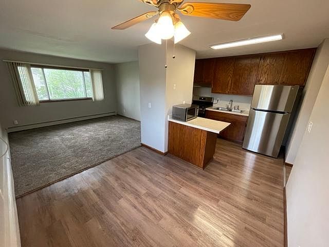 Unit 2 - Dining Room (fresh paint, polished vinyl flooring)